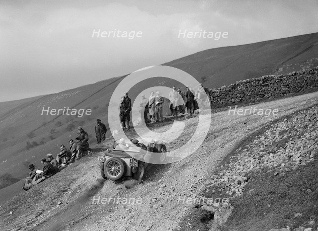 MG TA of JES Jones competing in the MCC Edinburgh Trial, 1937. Artist: Bill Brunell.