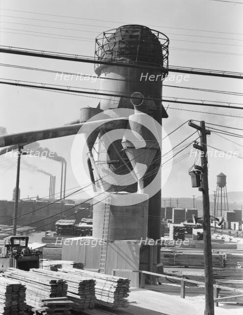Lumber burner and stacks of the Big Lakes Lumber Company..., Klamath Falls, Oregon, 1939. Creator: Dorothea Lange.