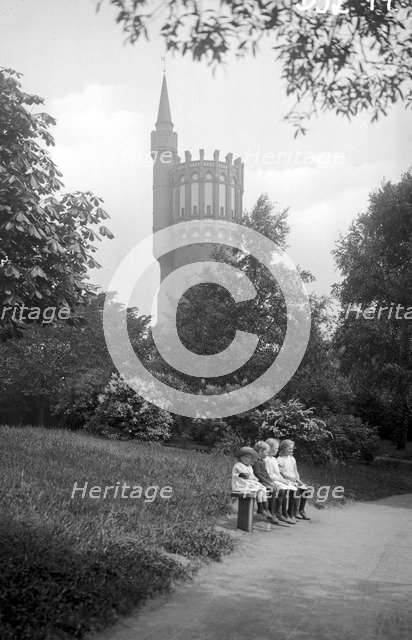 The water tower and four children on a bench in the park, Landskrona, Sweden, 1925. Artist: Unknown