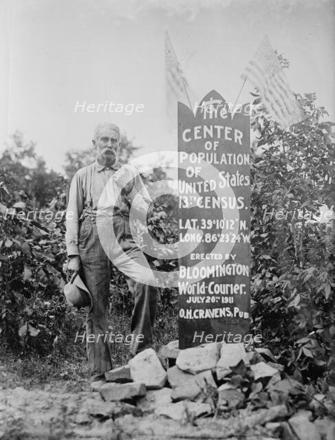 The Center of Population of U.S. [man standing next to memorial stone], between c1910 and c1915. Creator: Bain News Service.