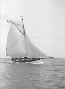 The cutter 'Nereid' sailing close-hauled, 1912. Creator: Kirk & Sons of Cowes.