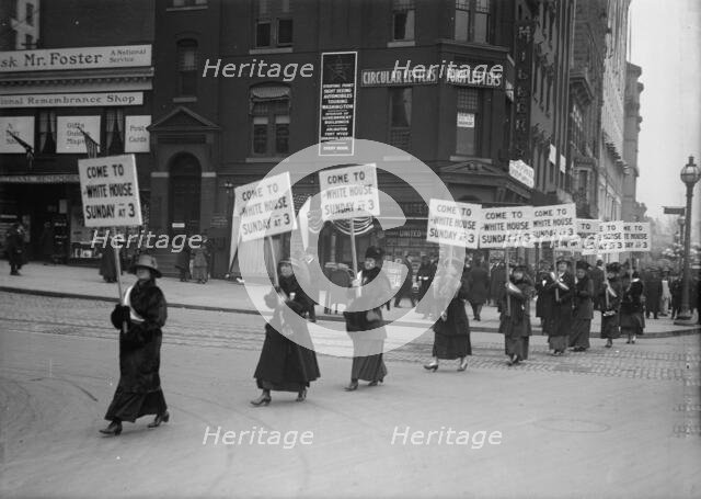 Woman Suffrage - Marching with Inv. Signs, 1917. Creator: Harris & Ewing.