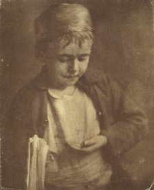 Newsboy looking at coins in his hand, half-length portrait, c1900. Creator: Elizabeth B. Brownell.