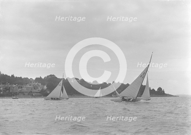 Group of 6 Metre yachts racing upwind, 1921.  Creator: Kirk & Sons of Cowes.