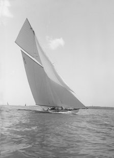 The 15 Metre 'Hispania' sailing close-hauled, 1911. Creator: Kirk & Sons of Cowes.