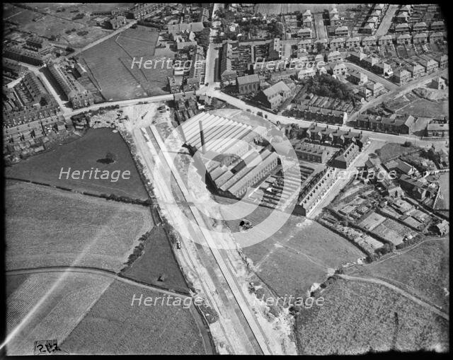 Hazelhurst Cotton Mill and the East Lancashire Road (A580)  under construction, Hazelhurst, c1930s. Creator: Arthur William Hobart.