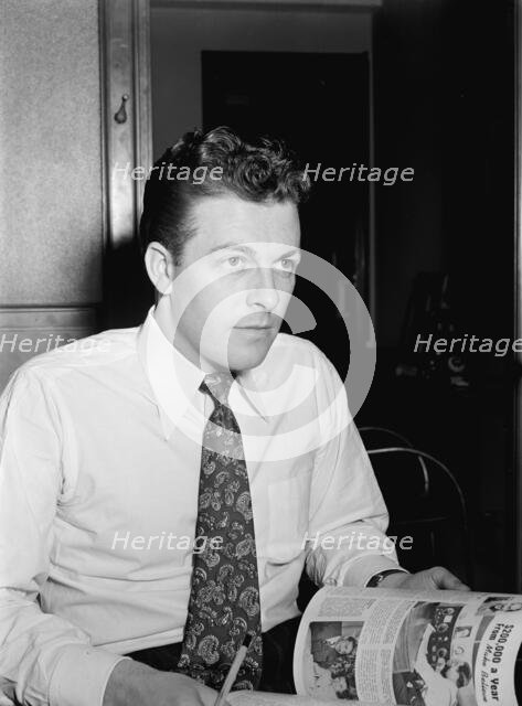 Portrait of Eddie Ronan, Down Beat office, New York, N.Y., 1946. Creator: William Paul Gottlieb.