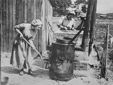 British women tending fat boilers at front, 24 Jul 1917. Creator: Bain News Service.
