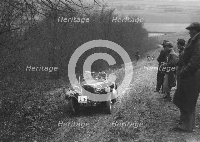 Singer 2-seater sports competing in a trial, Crowell Hill, Chinnor, Oxfordshire, 1930s. Artist: Bill Brunell.