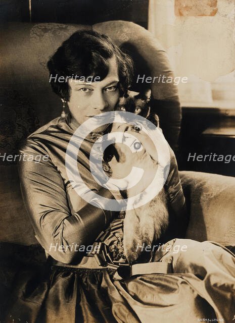 Tilla Durieux with Siamese cat, 1920s. Creator: Stone, Sasha (1895-1940).