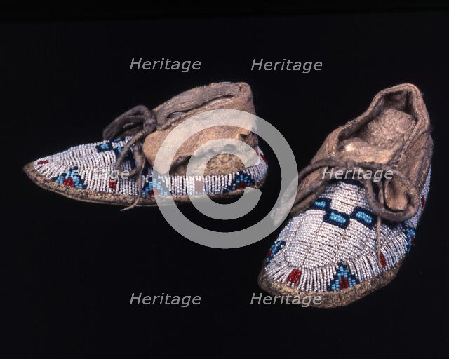 Pair of child's moccasins, Plains, possibly Sioux, c. 1885. Creator: Unknown.