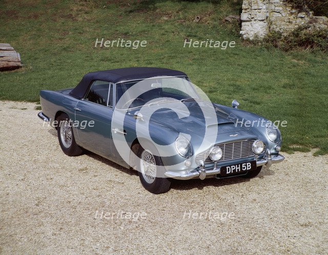 A 1964 Aston Martin DB5 sportscar. Artist: Unknown