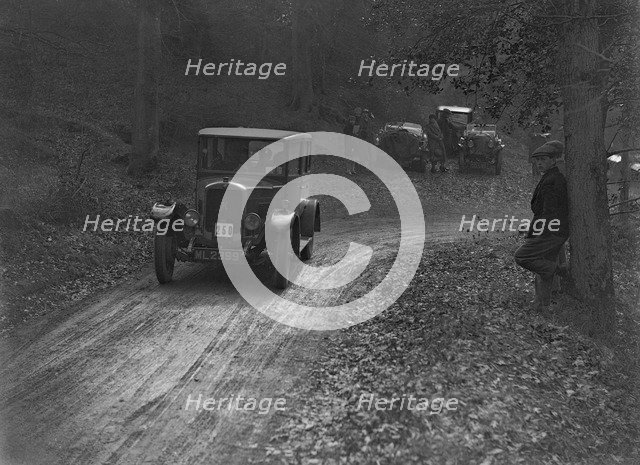 Hillman 11 saloon competing in the Sunbeam Motor Car Club Bognor Trial, 1929. Artist: Bill Brunell.