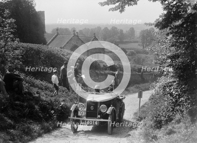 1931 Wolseley Hornet taking part in a West Hants Light Car Club Trial, Ibberton Hill, Dorset, 1930s. Artist: Bill Brunell.