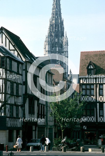 Half-timbered houses with St Maclou Church in the background, Rouen, Normandy, France