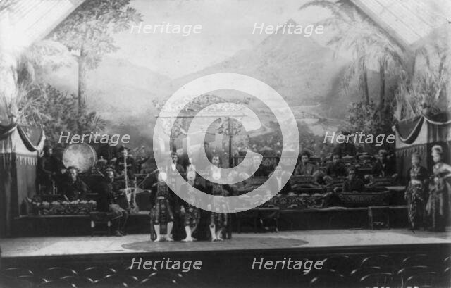 Javanese Gamelan Orchestra and Topeng masked dancers, World's Columbian Expo..., Chicago, 1891-1892. Creator: Frances Benjamin Johnston.