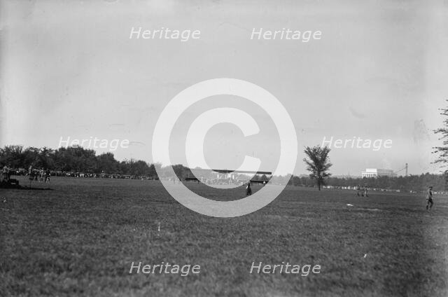 Allied Aircraft - Demonstration At Polo Grounds, Caproni Biplane, Italian, 1917. Creator: Harris & Ewing.
