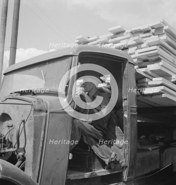 Sawn lumber leaving the mill by truck, Keno, Klamath County, Oregon, 1939. Creator: Dorothea Lange.