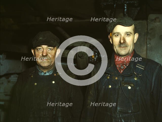 Workers at the roundhouse of the C & NW RR Proviso Yard, Chicago, Ill., 1942. Creator: Jack Delano.