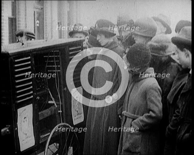 People Gathering Around a Large Outdoor Wireless, 1922. Creator: British Pathe Ltd.