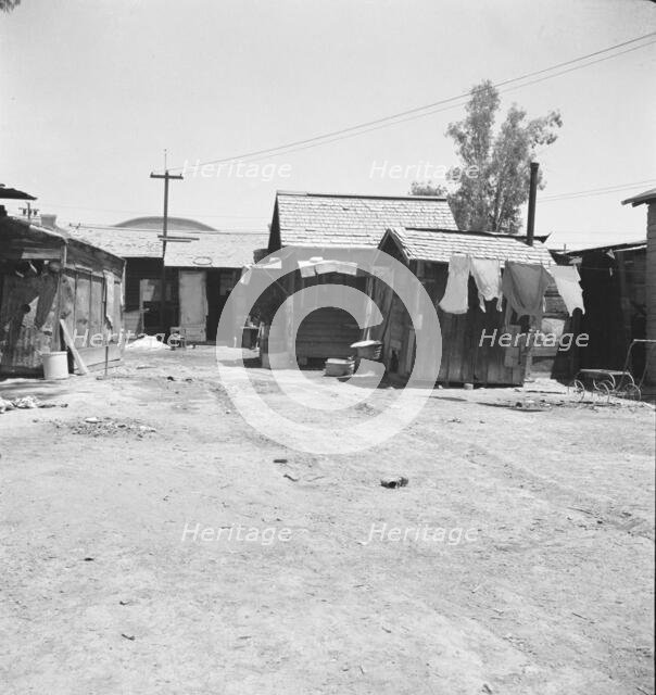 Homes of Mexican field workers, Brawley, Imperial Valley, California, 1935. Creator: Dorothea Lange.