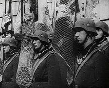 German Soldiers Standing With Flags, 1941. Creator: British Pathe Ltd.