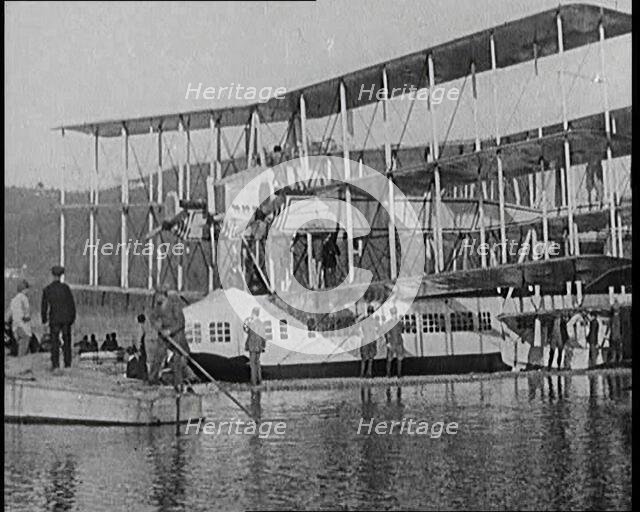 A Group of Passengers Boarding the Caproni Flying Boat, 1920s. Creator: British Pathe Ltd.