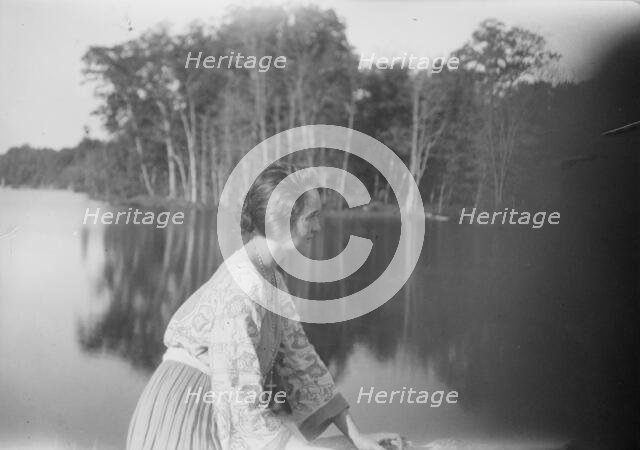 Mower, Margaret, Miss, seated outdoors, not before 1916. Creator: Arnold Genthe.