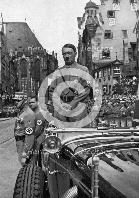 Adolf Hitler waiting for SA 'Brownshirts', Nuremberg, Germany, 1935. Artist: Unknown