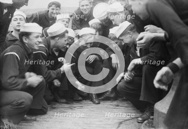 Shooting craps on NEW YORK, between c1910 and c1915. Creator: Bain News Service.
