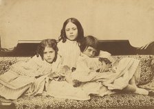 Edith, Ina and Alice Liddell on a Sofa, Summer 1858. Creator: Lewis Carroll.