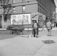 A Harlem street scene, New York, 1943. Creator: Gordon Parks.