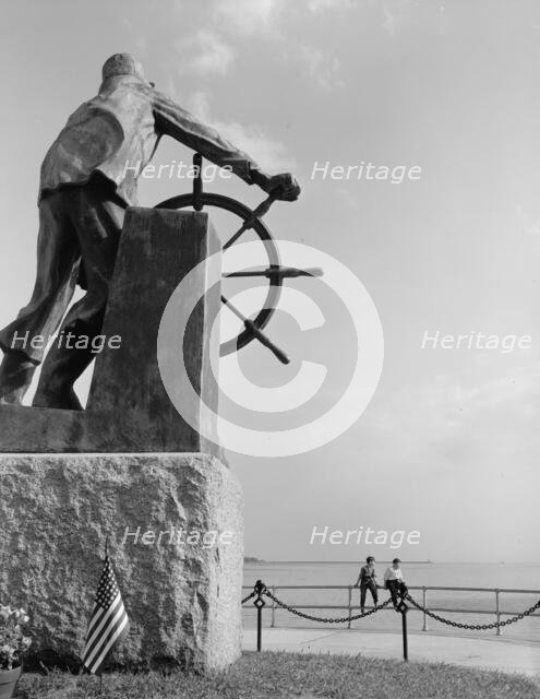 The bronze fisherman, a memorial to men lost at sea, Gloucester, Massachusetts, 1943. Creator: Gordon Parks.