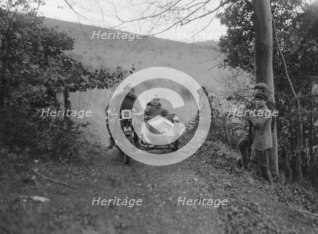 Norton and sidecar ridden by SL Grubb competing in the Inter-Varsity Trial, November 1931. Artist: Bill Brunell.