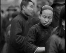 Chinese Men and Women Seeking Refugee from the Japanese Attack On Shangha..., 1937. Creator: British Pathe Ltd.