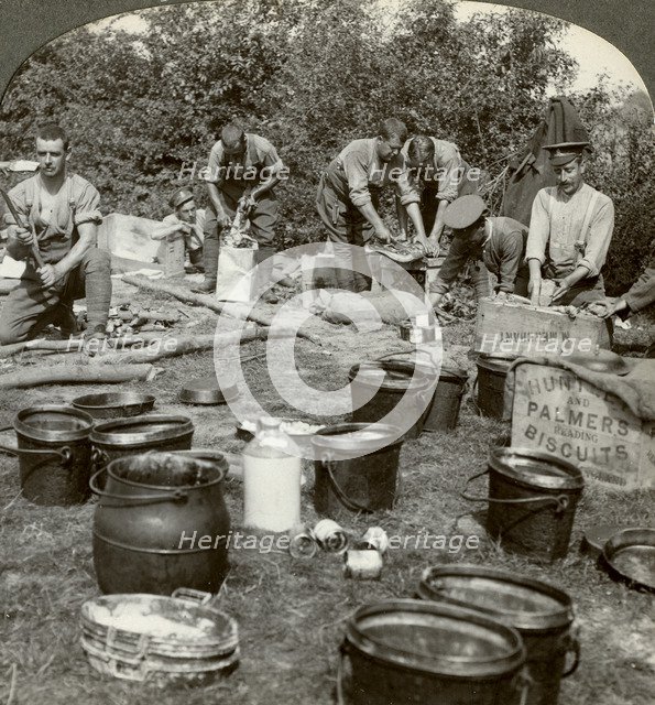 Army cooks preparing a meal, World War I, 1914-1918.Artist: Realistic Travels Publishers