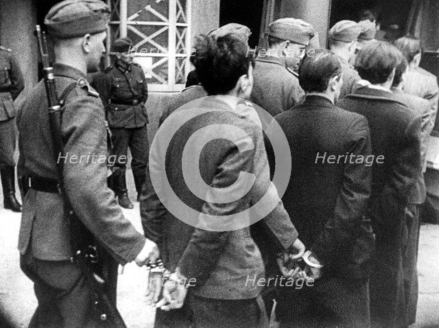 Members of the French Resistance being taken for execution after a trial, Paris, 14 April 1942 Artist: Unknown