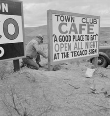 New sign along highway advertises a new enterprise in the lonely town of Maupin, Oregon, 1939. Creator: Dorothea Lange.