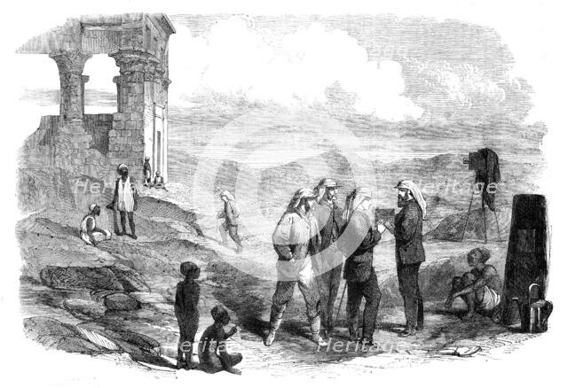 The Prince of Wales' Visit to Egypt: His Royal Highness examining the negatives taken by..., 1862. Creator: Unknown.