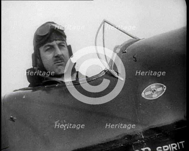 Alan Cobham in the Cockpit of a Plane, 1930s. Creator: British Pathe Ltd.
