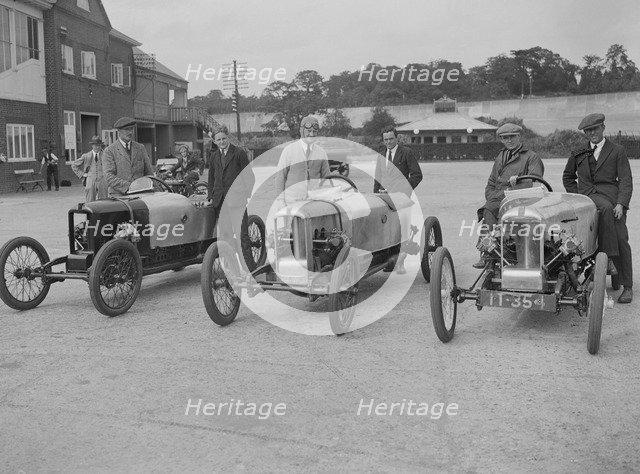 Cars at the JCC 200-mile Race, Brooklands, Surrey, 1921.   Artist: Bill Brunell.