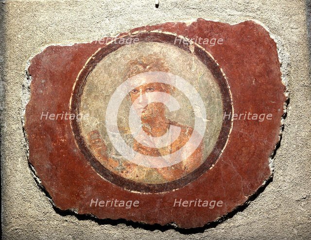 Medallion with a male figure holding a kantharos, 1st century. Creator: Roman-Pompeian wall painting.