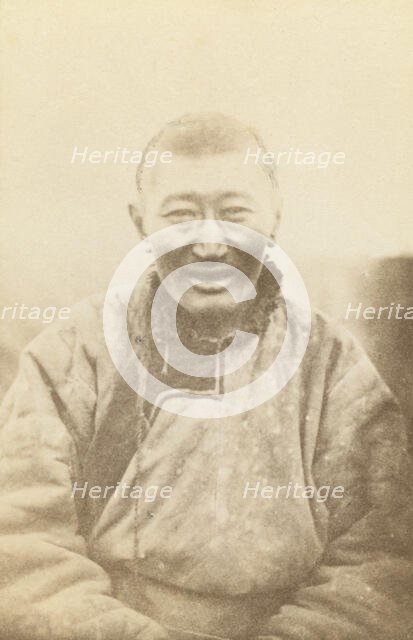 Half-length portrait of man, seated, facing front, between 1870 and 1886. Creator: Unknown.