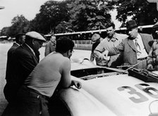 Alfred Neubauer with a Mercedes, Avus motor racing circuit, Berlin, Germany, 1938. Artist: Unknown