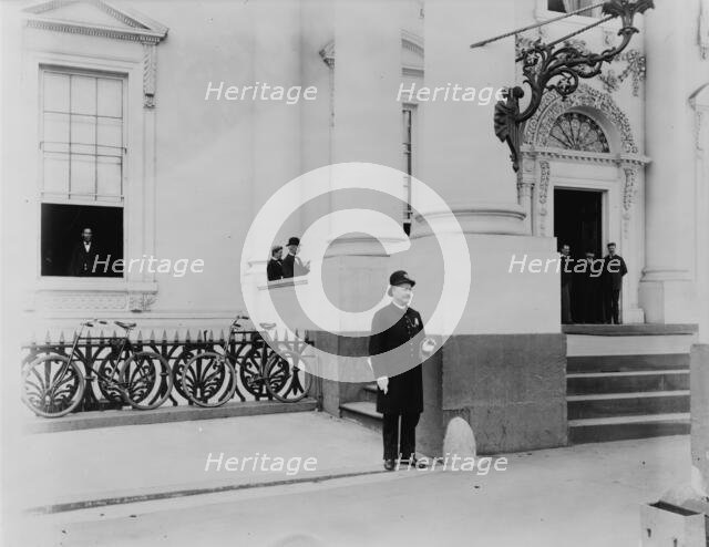 Policeman standing guard at entrance to White House, between 1889 and 1906. Creator: Frances Benjamin Johnston.