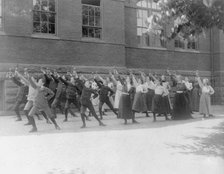 First Division school class exercising with barbells in schoolyard, Washington, D.C., (1899?). Creator: Frances Benjamin Johnston.
