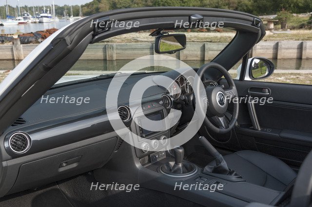 2014 Mazda MX5 Roadster Coupe Artist: Unknown.