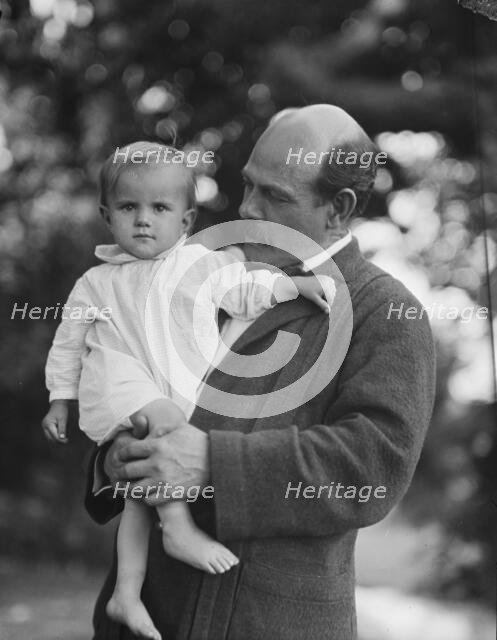 Borglum, Gutzon, Mr., and child, outdoors, 1917 Aug. 18. Creator: Arnold Genthe.