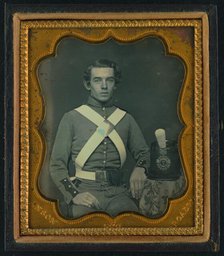 Unidentified soldier of 7th New York Infantry Regiment in uniform graphic /, between 1861 and 1863. Creator: Rufus Anson.