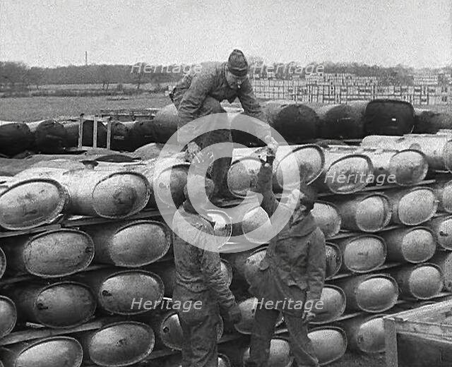 American Soldiers Working at a Fuel and Equipment Dump at an American Airfield in England, 1943-1944 Creator: British Pathe Ltd.